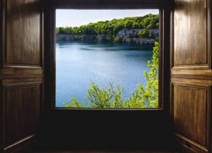 Window on the world - beautiful spring scene on the Lake Zakrzówek in Cracow, Malopolskie Province, Poland.
